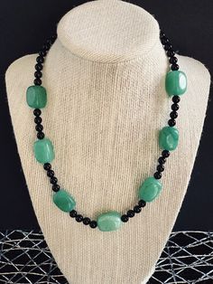 "Aventurine Nugget and Onyx Beaded Necklace, Choker, Collar Necklace, Gemstone Necklace, Women's Handmade Jewelry. Color is Green and Black. Materials are Aventurine, Onyx, and Stainless steel. Necklace has a stainless steel lobster claw closure. * Green Aventurine is known as the \"Stone of Opportunity,\" thought to be the luckiest of all crystals, especially in manifesting prosperity and wealth, or for increasing favor in competitions or games of chance. Its winning energy makes it a great all Healing Onyx Beaded Necklaces With Black Beads, Healing Onyx Beaded Necklace With Black Beads, Onyx Necklace With Black Beads For Healing, Healing Onyx Beaded Necklace, Onyx Beaded Necklaces For Jewelry Making, Black Natural Stones Beads For Jewelry Making, Black Natural Stones For Jewelry Making, Onyx Beaded Necklaces For Healing, Black Jade Round Beads Jewelry