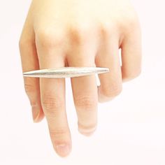 Double finger ring in sterling silver matt finished. Designed to be worn across two fingers. Adjustable sizes 6 & 7 across two fingers. (one size only) It is made to be adjustable so we can make sure can fit in your fingers. View other design at etsy store: http://www.etsy.com/shop/NaomiGunJewelry Thank you! © www.naomigun.com. All Rights Reserved. 2 Finger Ring, Double Finger Ring, Silver Casting, Two Fingers, Finger Ring, Ring Finger, Fit In, Etsy Store, Hong Kong