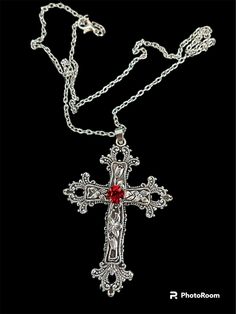 XL ornate cross necklace Tibetan silver with either a Red or a blue coloured stone  lobster clasp fastening  Chain length 18in (50cm) Cross length 4in  (75mm) Red Cross Necklace In Sterling Silver, Gothic Silver Cross Necklace, Gothic Silver Metal Cross Necklace, Gothic Metal Cross Necklaces, Vintage Red Cross Jewelry, Gothic Silver Pendant Cross Necklace, Silver Ankh Gothic Necklace, Handmade Red Crucifix Jewelry, Red Rosary Necklace