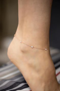 Our super dainty rose gold white stones anklet bracelet offers you a beautiful and elegant look for every occasion. This is surely a timeless piece and it is likely to be your new favorite for a stylish look. That dainty anklet bracelet would match well with anything in your closet. Hypo-allergenic, lightweight and minimalist.  That jewelry would also make a perfect gift for women 💖🎁 💫Listing is for 1 super dainty rose gold white stones anklet bracelet. 💎It is made of 925 sterling silver and Elegant Cubic Zirconia Anklets, Adjustable Cubic Zirconia Anklets For Gift, Minimalist Rose Gold Anklet As Gift, Dainty Rose Gold Anklet As Gift, Dainty Rose Gold Anklets For Gift, Elegant Anklet, Rose Gold Anklet, Gold Knot Ring, Anklet Designs