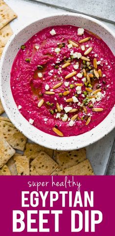 a bowl of beet dip with pita chips on the side and text overlay reading super healthy egyptian beet dip