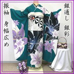 This furisode (long-sleeved kimono) has large lilies dyed on a green and off-white background with silver threads woven into the fabric. It is decorated with silver threads and point embroidery. The fashionable colors and silver threads on the ground are not too simple and modern, making it a very popular item. Sleeve length: 72.5 cm Length (from the shoulder): 168.5cm Sleeve width: 36.3cm Sleeve length: 112.5cm Front width: 28 cm Back width: 32cm Stitching on body side: 2cm Sleeve side: 2.5cm W Green Kimono, Long Sleeve Kimono, Silver Embroidery, Luxurious Wedding, Japanese Patterns, Japanese Kimono, Unique Items, Japanese Culture, Gorgeous Design