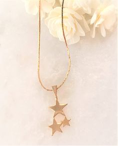 "16\" Dainty Gold Tone Box Chain Necklace with Triple Star Gold Pendant Star Pendant Measures 1 1/8\" Long x 1/2\" Wide Polished Gold Tone Triple Star Pendant is Removable Gold Tone Spring Ring Clasp Made in USA COMPLIMENTARY DOMESTIC SHIPPING" Gold Star-shaped Jewelry For Mother's Day, Gold Star Jewelry For Mother's Day, Gold Nickel-free Star Of David Necklace, Gold Star Of David Necklace Nickel Free, Rose Gold Star Charm Pendant Necklace, Star-shaped Necklace For Mother's Day Gift, Rose Gold Pendant Necklace With Star Charm, Mother's Day Star-shaped Necklace Gift, Mother's Day Star Shaped Necklace Gift