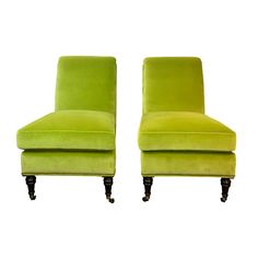 a pair of lime green velvet chairs