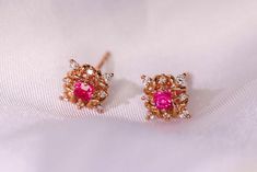 •Condition: Brand new•Center Stone: Natura Peach Red Spinel, approx 0.23ct•Side Stone: Natural white diamond, round cut (VS1 clarity and F color)  •Earrings Weight: 1.73g•Metal Purity: Optional•Sell as pair Each piece is made-to-order with care and special attention to detail. all items are made with conflict-free diamonds and gems.The item will be gift wrapped and shipped.---------------------------------------------------------Available in :14k Rose or Yellow Gold, White Gold18k Rose or Yellow Formal Rose Gold Ruby Earrings, Rose Gold Ruby Earrings For Gifts, Pink Gold Jewelry With Halo Design As A Gift, Party Rose Gold Gemstone Earrings, Rose Gold Ruby Round Earrings, Pink Ruby Earrings For Anniversary, Elegant Rose Red Earrings For Party, Elegant Rose Red Earrings For Valentine's Day, Dainty Pink Earrings For Formal Occasions