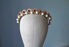 Wedding pearl tiara, Red crystal bridal crown ~MATERIALS~ -Austrian red glass crystals -Czech glass pearl -Gold filigree ~SIZE~ Height  1 inch (2,5 см) ~SHIPPING AND DELIVERY TIME~ This headpiece is ready to ship by 3-5 days The approximate time of shipment: - 10-16 days to Europe - 15-35 days to United States and other countries. ~IMPORTANT INFORMATION~ -Please allow as much time for shipping as possible before your important date ! I can't guarantee shipping time as its beyond my control.  -Ru Red Tiara, Tiara Gold, Pearl Crown, Pearl Headpiece, Pearl Tiara, Red Crown, Gold Tiara, Bridal Crown, Headpiece Wedding