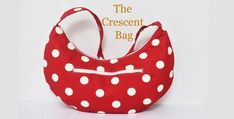 a red and white polka dot purse with the words the crescent bag written on it