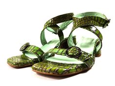 Handmade pistachio green croco leather sandals in chunky low heel. Modern strappy design with square toe and adjustable straps, that embrace and flatters all feet types! Their low block heel and their very soft insole offer true comfort. Genuine leather on the upper and inner parts, soft leather lining and antislip elastic rubber sole. High quality shoes, guaranteed to last for a long long time! PRODUCT INFO Color: green Upper material: 100% leather Linning: 100% leather Heel: leather wrapped He Trendy Green Block Heels With Round Toe, Trendy Green Heels With Heel Strap, Green Square Toe Heels For Summer, Green Sandals With Padded Low Heel, Green Block Heels With Stacked Heel And Round Toe, Trendy Green Heels With Buckle Closure, Green Square Toe Heels For Spring, Spring Green Square Toe Heels, Green High Heel Slingback Sandals With Padded Heel