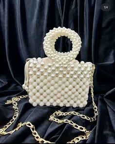 🌟 Elevate your style with this exquisitely crafted handbag adorned with pearl details. 🌟 Handcrafted with care, this bag is designed to add a touch of sophistication to every moment. The elegance of the pearl embellishments sets this bag apart, transforming it into a unique accessory. 🌸 Why Choose This Bag? 🌸 More than just an accessory, this bag is an opportunity to reflect your style and grace. Whether for a special event or to enhance your daily chic, this pearl-adorned bag complements every outfit perfectly. Consider gifting it to your loved ones to make their special moments even more meaningful. 🌟 Bag Size: 16x12 cm 🎁 Package Includes: 1 Handmade Bag with Pearl Details Carefully packaged, suitable for gifting 💌 Fast and Secure Delivery: Our products are meticulously packaged a Cream Evening Bag With Pearl Handle, Beaded Pearl Bags For Events, Pearl Beaded Bags For Events, Pearl White Shoulder Bag With Pearl Handle For Events, White Evening Bag With Pearl Chain, Handheld Pearl Evening Bag Handmade, Handmade Pearl Evening Bag For Events, Handmade Pearl Handheld Evening Bag, White Evening Bag With Pearl Handle