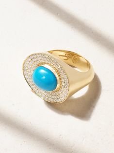 An avid collector of vintage jewelry, Jenna Blake's ambition is to create modern heirlooms that'll be treasured for generations to come. Crafted from 18-karat gold, this ring is set with a vibrant turquoise cabochon illuminated by three halos of prong-set diamonds. Luxury Turquoise Gemstone Ring, Luxury Turquoise Diamond Ring As Gift, Luxury Turquoise Diamond Ring, Luxury Oval Turquoise Ring, Formal Turquoise Diamond Ring, Formal Turquoise Diamond Ring With Gemstone, Formal Fine Jewelry Turquoise Diamond Ring, Luxury Turquoise Jewelry With Center Stone, Luxury Turquoise 14k Gold Ring