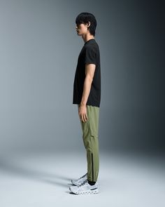 Lightweight and stretchy, these pants are dedicated to enhancing the joy of running. Made to move with you. Any direction. Any rhythm. The Core Pants move with you, thanks to an elastic waistband, gusset insert and pre-shaped knee construction. Plus, a hem that zips up to the knee makes changing into your gear a breeze. Engineered for 100% focus. No distractions. Just the run. A drawcord at the waist ensures a secure fit. And two side pockets mean you can keep essentials to hand. The lightweight Athleisure Pants With Elastic Side Panels, Sporty Green Pants With 4-way Stretch, Athleisure Pants With 4-way Stretch And Elastic Side Panels, Athleisure Ankle-length Pants With Elastic Side Panels, Green 4-way Stretch Athleisure Pants, Stretch Moisture-wicking Cargo Pants, Functional Green Pants With 4-way Stretch, Sporty Green Pants With Elastic Side Panels, Sporty Ankle-length Cargo Pants