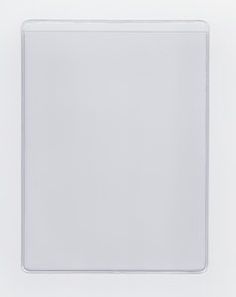 a white square shaped object on a white surface with an empty space for the image to be displayed