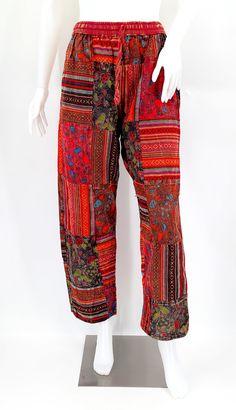 Bohemian Patchwork Pants For Spring, Traditional Patchwork Pants For Summer, Traditional Multicolor Bottoms For Festival, Traditional Patchwork Bottoms For Spring, Bohemian Harem Pants With Patchwork, Traditional Multicolor Pants For Festival, Bohemian Multicolor Straight Pants, Folk Style Cotton Bottoms For Festivals, Bohemian Festival Pants With Patchwork