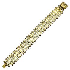 Wonderful Jakob Bengel Art Deco gold tone bracelet with brickwork links and an ornate clasp. Circa 1930s. Measuring length 17.8 cm / 7 inches by width 1.9 cm / .75 inch. The bracelet is in very good condition, there is some wear to the gold tone metal finish. This stylish Jakob Bengel bracelet is very well made, the shiny brickwork links look lovely glinting in the light. Gold Metal Bracelet With Clasp, Antique Gold Bracelets With Box Clasp, Antique Gold Rectangular Bracelet, Gold Jubilee Beaded Bracelets For Formal Occasions, Formal Rectangular Gold Bracelet, Vintage Gold Bracelets With Rectangular Links, Rectangular Metal Bracelet With Box Clasp, Vintage Gold Beaded Jubilee Bracelet, Vintage Gold Bracelet With Rectangular Links