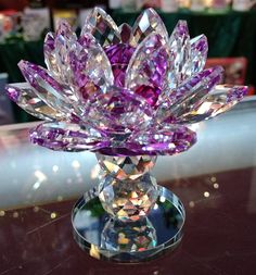 On Sale While Supplies Last! Medium - Approx. 4.25" across, 4.5" high Lotus on Crystal Base, all one piece and just gorgeous! These crystal lotus have to be seen to believed just how stunningly gorgeous they are! With a real crystal ball at the center and real crystal petals blossoming out, this would make a wonderful gift for just about anyone on your list. Need a birthday gift? Need a housewarming gift? Need a christening gift? This would work for absolutely anyone. And, if you set it where th Crystal Flowers Diy, Crystal Lotus, Skull Girl Tattoo, Swarovski Crystal Figurines, Quince Decorations, Real Crystals, Crystal Aesthetic, Crystal Goddess, Blue Aesthetic Pastel