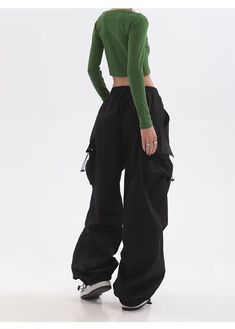 Features: Introducing the Women Punk Cargo Pants, perfect for the fashion-forward. Designed with a high waist and wide leg, these pants not only provide a flattering fit but also add a touch of streetwear edge to your wardrobe. Made with lightweight material, these pants are perfect for the summer season. Upgrade your style with these American Retro-inspired trousers. Y2k Style Trousers For Fall, Y2k Trousers For Fall Season, Y2k Style Fall Trousers, Fall Y2k High-waisted Pants, Fall Y2k Style Trousers, Fall Y2k Trousers, Black Baggy Y2k Parachute Pants, Urban Style Baggy Parachute Pants With Wide Legs, Y2k Style High Waist Baggy Cargo Pants