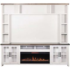 a white entertainment center with an open fireplace