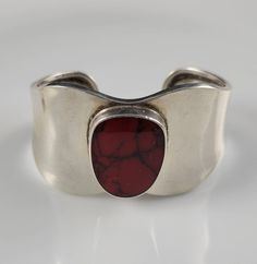 "Measurements; 2.50\"-from end to end (length) 1.75\" front to back Stone Size-22mm by 27mm *Weighs-38 grams *Lovely design featuring a genuine Bloodstone Agate set in a heavy, well made, sterling silver cuff. *Stamped Sterling, Mexico. *Rare Find dating from the 1950s. *Handwrought by an expert Artisan in Mexico. *Made of heavy, solid sterling silver & genuine bloodstone agate. *In excellent vintage condition considering. Shows normal signs of wear & a minor amount of patina normal for it's age 1950s Bracelet, Indie Jewelry, Nail Jewelry, Dope Jewelry, Funky Jewelry, Sterling Silver Cuff, The 1950s, Silver Cuff, Pretty Jewellery