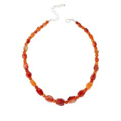 Jay King Sterling Silver Tangerine Chalcedony Bead 18" Necklace Tangerine chalcedony in varying shades of orange, give this handcrafted beaded necklace a fun, festive vibe. From Jay King.       Approx. 18"L x 1/2"W with 2-3/4" extender     Stamped .925     Hook closure     Gemstone bead necklace comprised of freeform and round multi-hued orange chalcedony beads   Stone Information       All sizes and weights approximate     Stabilized Tangerine Chalcedony - Freeform (7x10mm to 14x16mm), round (6 Artisan Single Strand Orange Beaded Necklace, Elegant Orange Beaded Necklaces With Gemstone Beads, Elegant Orange Gemstone Beads Necklace, Elegant Orange Gemstone Beaded Necklaces, Orange Gemstone Round Beads Jewelry, Artisan Adjustable Orange Necklace, Adjustable Orange Artisan Necklace, Artisan Orange Adjustable Necklace, Orange Polished Beads Necklace