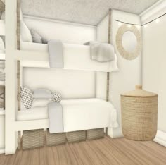 a room with bunk beds and baskets on the floor in front of it, along with a round mirror