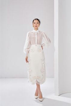 The shirt is perfect for adding a touch of sophistication to any outfit. Featuring long, puffy sleeves and a see-through chiffon design, it is sure to add a stylish touch to any ensemble. Elegant Wedding Blouse With Set-in Sleeves, Elegant Long Sleeve Blouse With Set-in Sleeves, Elegant Summer Blouse With Set-in Sleeves, Sheer Puff Sleeve Chic Blouse, Chic Blouse With Bishop Sheer Sleeves, Fitted Chiffon Blouse With Puff Sleeves, Elegant Blouse With Sheer Puff Sleeves, Elegant Padded Blouse With Balloon Sleeves, Feminine Evening Blouse With Lantern Sleeves