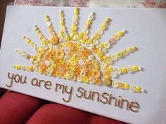 a handmade card with buttons on it that says you are my sunshine