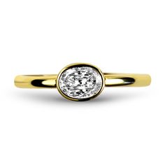 An 18k yellow gold Christopher Designs Crisscut L'Amour Oval diamond ring. The ring features a center L'Amour Crisscut oval diamond set in a bezel. The oval diamond has a carat weight of .42 and a color and clarity grade of K/VS. The ring is completed with a yellow gold shank. The ring is marked with the Christopher Designs serial number "V12000", the Christopher Designs logo, and "750". Finger size 6.50. Crisscut Diamond, Oval Diamond Ring, Oval Diamond, Diamond Ring, Logo Design, Yellow Gold, Yellow, Gold, Color