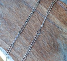 This chunky solid sterling silver chain has an amazing sparkle! It is very stylish, extra long oval link chain with hand forged hook.  Wear it alone or combine with your other sterling silver necklaces. Link size is 25mm by 4.4mm  It can be worn as a Y necklace as well, since you can attach the hook to any link of the chain.   The chain measures about 20.5 inches long including my handmade hammered hook. I can't make longer necklace for this particular variety of chain, but I can make it shorter Silver Chain Necklace With Hook And Links For Gift, Silver Oval Paperclip Chain Necklace, Y Necklace, Santa Clara, Sterling Silver Chain, Hand Forged, Link Chain, Sterling Silver Chains, Extra Long