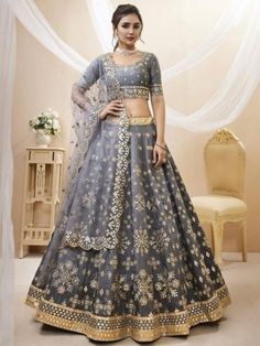 "Gorgeous Designer Silk Lehenga for woman Lahanga Bollywood Marriage Ghaghra Choli Indian Wedding Bridal Lahnga Party Wear Lengha Choli Adorn yourself by wearing this Beautiful lehenga in Mulberry silk material embellishes with all-over Foil Mirror and zari embroidery work and come with silk inner. This lehenga comes with an attached can can inside. ITEM DESCRIPTION Lehenga (Semi-Stitched) Fabric : Mulberry silk Work : Foil(paper) Mirror And Zari embroidery work Inner : Silk with Canvas and Can Grey Lehenga, Mehndi Outfit, Bridesmaid Lehenga, Lehenga Choli For Women, Choli For Women, Sabyasachi Lehenga, Reception Lehenga, Party Wear Lehenga Choli, Lengha Choli