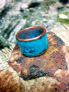 * Enameled Blue Copper ring Band. * 10, 12, 14 mm Wide. Mark your wide on the option. * Advice your Ring Size on the Note. Unique Blue Enamel Ring, Artisan Blue Rings With Patina, Unique Blue Patina Rings, Unique Hand Painted Blue Rings, Hand Painted Unique Blue Rings, Copper Ring, Copper Rings, Sapphire Blue, Ring Band