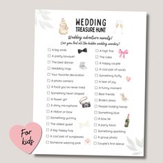 the wedding checklist is shown with pink hearts and flowers on it's side