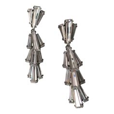 Crystal Earrings in the Art Deco Style | Chairish Silver Baguette Cut Diamond Earrings For Formal Occasions, Diamond Cut Chandelier Earrings For Evening, Evening Diamond Cut Chandelier Earrings, Formal Sterling Silver Earrings With Baguette Diamonds, Sterling Silver Baguette Diamond Earrings For Formal Occasions, Formal Sterling Silver Baguette Diamond Earrings, Modern Silver Jewelry With Baguette Diamonds, Elegant Silver Baguette Diamond Earrings, Evening Diamond Cut Earrings