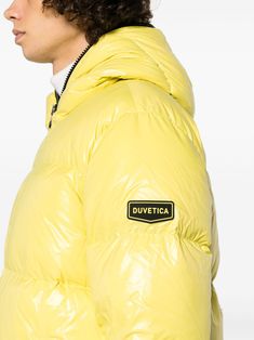 logo-patch padded jacket from DUVETICA featuring canary yellow, feather down, padded design, quilted, high-shine finish, logo patch at the sleeve, contrasting trim, high neck, classic collar, front zip fastening, long sleeves, two side zip-fastening pockets and straight hem. When buying this unisex item, keep in mind that it is graded in standard men's sizing.. Size Info IT Color Detail Yellow Made In Vietnam Material Polyamide 100% Season One Fall-Winter Season Two Fall-Winter Product coats Bra Designer Winter Outerwear With Logo, Designer Winter Outerwear With Logo Detail, Yellow Feathers, Trench Dress, 1017 Alyx 9sm, Latest Fashion Design, Canary Yellow, Moon Boots, Cape Coat