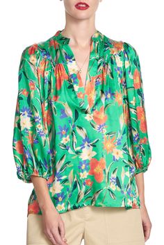 The Corinne top features an elegant V neck with placket and a yoked shoulder with a 3/4 length blouson sleeve. Here, it is presented in our Brushed Floral print on satin with body and yoke lining included. Content: 70% cotton / 30% poly Color: Fern Fits: Close fit. Take your normal size. Sizes: XS-L What we Love: Great print, perfect blouse. Made in Los Angeles with Love Patricija is 5'10" size 2 and is wearing a size S xs s m l length 23.5 24 24.5 25 sweep 41.5 43.5 45.5 48.5 bust 38 40 42 45 Teal Tie, Perfect Blouse, Blouson Sleeve, Women's Button Down Shirt, Orange Blouse, Animal Print Blouse, Flowy Blouse, Bell Sleeve Blouse, Weekend Style