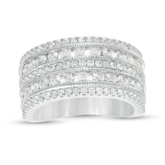 a white gold ring with rows of diamonds