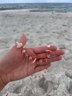 Orange vibes with starfish and REAL shells Vacation Shell Necklace With Starfish Charm, Star-shaped Necklaces For Beach Summer, Beachy Starfish Necklaces For Vacation, Beachy Starfish Necklace For Vacation, Starfish Shell Necklace For Vacation, Ocean-inspired Starfish Beaded Necklaces, Ocean-inspired Starfish Shell Necklace For Vacation, Ocean-inspired Starfish Shell Necklace For Summer, Summer Ocean-inspired Starfish Shell Necklace