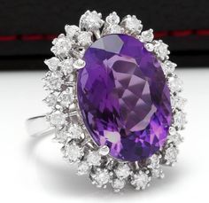 15.30 Carats Natural Amethyst and Diamond 14K Solid White Gold Ring Suggested Replacement Value $9,800.00 Total Natural Oval Shaped Amethyst Weights: Approx. 14.00 Carats Amethyst Measures: Approx. 18 x 14mm Natural Round Diamonds Weight: Approx. 1.30 Carats (color G-H / Clarity SI1) Ring total weight: Approx. 9.0 grams Disclaimer: all weights, measurements and colors are approximate and may vary slightly from the listed dimensions or as seen in the image. All pictures are magnified to show the Beautiful Tiaras, Purple Sparkle, Purple Girls, Purple Jewelry, Etsy Gold Ring, White Gold Ring, Diamond Watch, Quality Diamonds, White Gold Rings