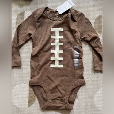 Nwt! For The Littlest Football Fan Size 9 Months. Brown Onesie For Playtime In Fall, Brown Fall Onesie For Playtime, Fall Playwear Onesie, Cute Brown Tops For Playwear, Fall Playtime Brown Onesie, Brown Long Sleeve Tops For Playtime, Cute Brown Tops For Playtime, Fitted Tops For Fall Playwear, Strawberry Romper