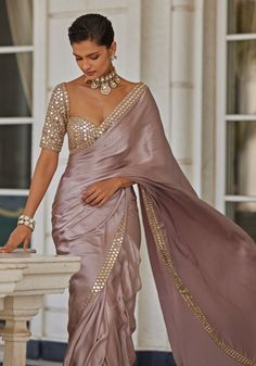 Buy Pink Satin Saree With Embroidered Mirror Blouse by Vvani by Vani Vats at Fabilicious Fashion! Shop made-to-measure Indian wedding wear and jewellery with fast shipping to USA, UK, and Canada. Blouse Designs For Satin Silk Saree, Saree For Cocktail Party Indian Weddings, Girly Saree Indian Weddings, Party Wear Sarees For Women, Satin Sarees With Designer Blouses, Sangeet Saree Outfit, Rose Gold Colour Saree, Partywear Saree Blouse Designs, Janhvi Kapoor Indian Outfits