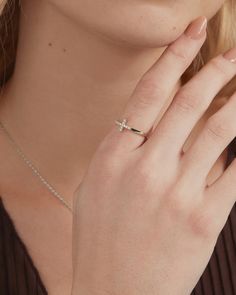 This cute cross ring for women is a great stackable ring. The cross features premium cubic zirconia.This ring is plated in Rhodium plating for a long-lasting finish and making it a great necklace for everyday wear or a perfect gift for birthdays, anniversaries, Christmas, graduation, mother's day, first communion, and more! Materials Measurements: Length: 12.2mm x 7.6mm; Thickness: 1.6mm. Ring Size: 5, 6, 7, 8, 9. Stone sizes: 1.25mm. 14K yellow or white gold plated. AAAAA Cubic Zirconia. Hypoal Necklace For Everyday, Cute Cross, Cross Ring, Stackable Ring, First Communion, Ring For Women, Stackable Rings, The Cross, Rhodium Plated