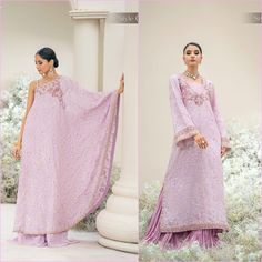 Product Details: Embroidered Medium Silk Front Embroidered Organza Neckline Finishing Embellished + Embroidered Organza Neckline Embroidered Medium Silk Back Embellished + Embroidered Organza Borders (x2) Embroidered Medium Silk Sleeves Masoori Silk Pants Style 01: Kaftan with Sharara Pants Style 02: Long Shirt with Crushed Sharara Pants Purple Floor-length Gown With Floral Embroidery, Elegant Lavender Party Sets, Embroidered Purple Gown For Festive Occasions, Sleeveless Lavender Dress For Wedding, Elegant Purple Gown With Floral Embroidery, Lavender Sleeveless Dress For Wedding, Sleeveless Embroidered Dress With Resham For Wedding, Purple Anarkali Dress With Floral Embroidery, Purple Embroidered Floor-length Gown