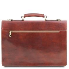 Experience the elegance of a true Italian leather briefcase. Handcrafted with precision by skilled artisans in Tuscany, this briefcase embodies the essence of Italian craftsmanship. Made from 100% full-grain leather, it merges luxury and functionality seamlessly. Ideal for professionals, its semi-rigid structure and three compartments ensure ample space for documents, a laptop, and other essentials. Featuring antique brass or nickel hardware, this italian leather briefcase is built to last. The Classic Briefcase For Business Meetings, Classic Smooth Grain Briefcase For Business Meetings, Luxury Brown Rectangular Briefcase, Classic Briefcase With Smooth Grain For Business, Italian Leather Briefcase For Formal Use, Elegant Cognac Rectangular Case Bag, Luxury Leather-lined Satchel Briefcase, Elegant Business Bag In Cognac, Brown Top Handle Laptop Bag For Formal Use