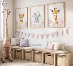 a baby's room decorated in neutral colors with giraffes and elephants on the wall