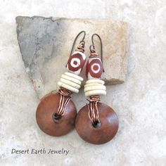 These Earrings Have An Earthy Boho Style With A Touch Of Tribal Flair And Feature Brown Wood Beads Wire Wrapped In Copper Wire Accented With African Agate Stones With An Etched Pattern. Slices Of Ostrich Egg Shell Beads Add A Nice Contrast. Brand New - Never Worn - Handmade By Me. Measurements: Total Length: 2-1/8” From Top Of Niobium (Hypoallergenic) Ear Wires And 3/4" At Widest Point. Boho Earrings Diy, African Trade Bead Jewelry, Copper Earrings Handmade, African Inspired Jewelry, Earth Jewelry, Ostrich Egg, Handmade Boho Jewelry, Paper Bead Jewelry, Starburst Earrings