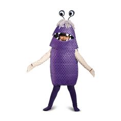 a child in a purple monster costume with large eyes and long legs, standing on one leg