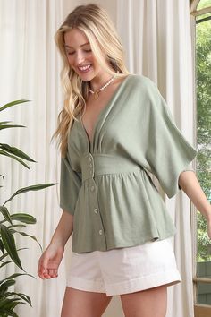 Unleash your daring side with our SS deep V neck button down top! The plunging neckline and stylish buttons make for a playful and versatile piece. Perfect for a night out or adding a touch of edginess to your everyday wardrobe. *Deep V neckline button down blouse with draped sleeves*Pattern type : solid* Color : sage*Neck line : V neck*Sleeve type : kimono sleeves*Sleeve length : short sleeves*Stretch : no stretch*Sheer : lined at upper front, no see through*Functional buttons for opening *Care Kimono Blouse, Draped Sleeves, Athleisure Tops, Drape Sleeves, Boutique Collection, Kimono Sleeves, Kimono Sleeve, Button Down Blouse, V Neckline