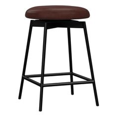 the backless stool is made from black metal and has a brown leather cushion on it