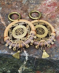 Tibetan Steampunk / Sri Yantra style.  Large earweights.   These beautiful brass and copper tribal weights sing High Priestess!  In balance of the feminine and the masculine within all. Made with a bronze clip hook to slide easily into stretched ears that will not fall off or be lost easily. Each earring weighs approx 29grams each. You will receive the pair shown in the photo carefully packaged with love ♡ Steampunk Earrings, Sri Yantra, Style Steampunk, High Priestess, Brass And Copper, Ear Weights, Stretched Ears, Large Earrings, Etsy Jewelry