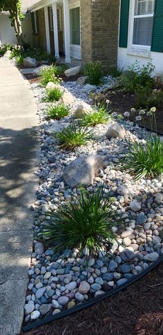 the front yard is clean and ready to be used as a landscaping area for this house