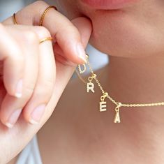 Our customisable charm jewelry serves as a dainty and personal piece. It comes in two options: necklace OR bracelet and I'm in love with both. Feel free to personalise it anyway you want in alphabet and/or numerical charms. What would you come up with as a self expression? We are offering this piece in 14K Gold Plated 925S Sterling Silver, rhodium plated. It is the only piece that is not offered in stainless steel or solid gold. The rhodium plating makes this beautiful personalised jewelry hypoa Dainty Adjustable Customizable Necklace, Customizable Dainty Necklace With Adjustable Fit, Customizable Dainty Adjustable Necklace, Charm Necklaces With Adjustable Chain For Personalized Gifts, Customized Dainty Jewelry For Everyday, Adjustable Charm Necklace For Personalized Gift, Dainty Adjustable Customizable Jewelry, Customizable Adjustable Initial Pendant Jewelry, Dainty Adjustable Charms For Gifts